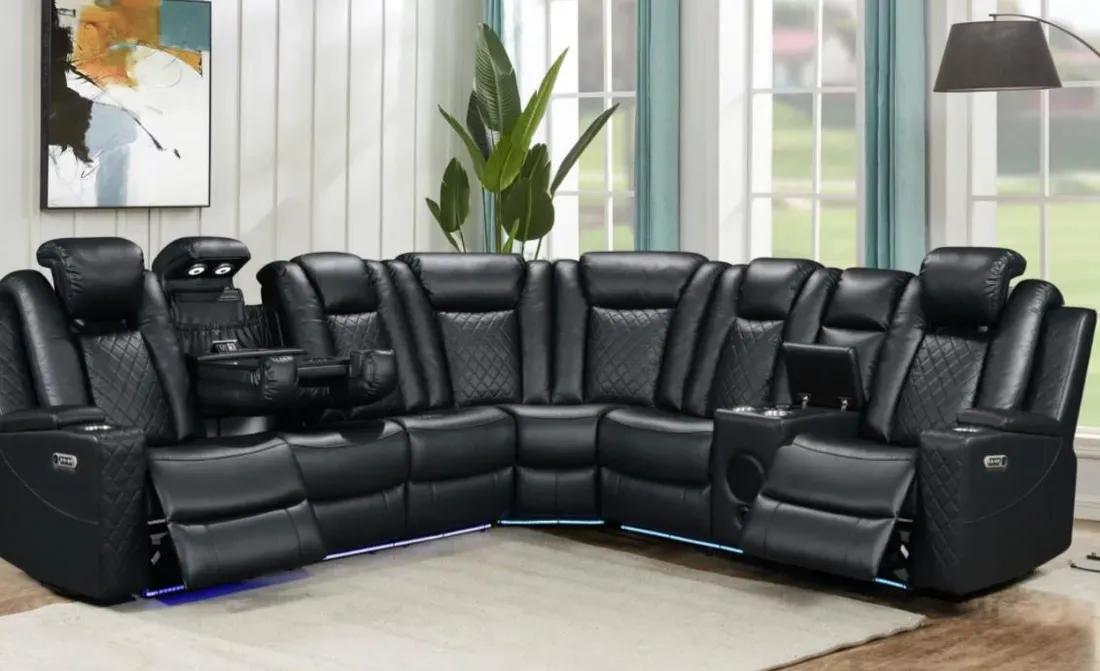 Black leather 3-piece power-reclining sectional with diamond quilting, LED floor lighting, storage consoles, and cup holders